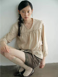 Relaxed V-Neck Tie Front Ruffle Blouse