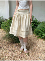 SOOMIE Ribbon Zip Midi Skirt