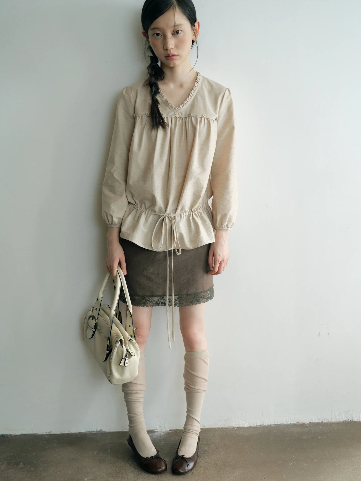 Relaxed V-Neck Tie Front Ruffle Blouse
